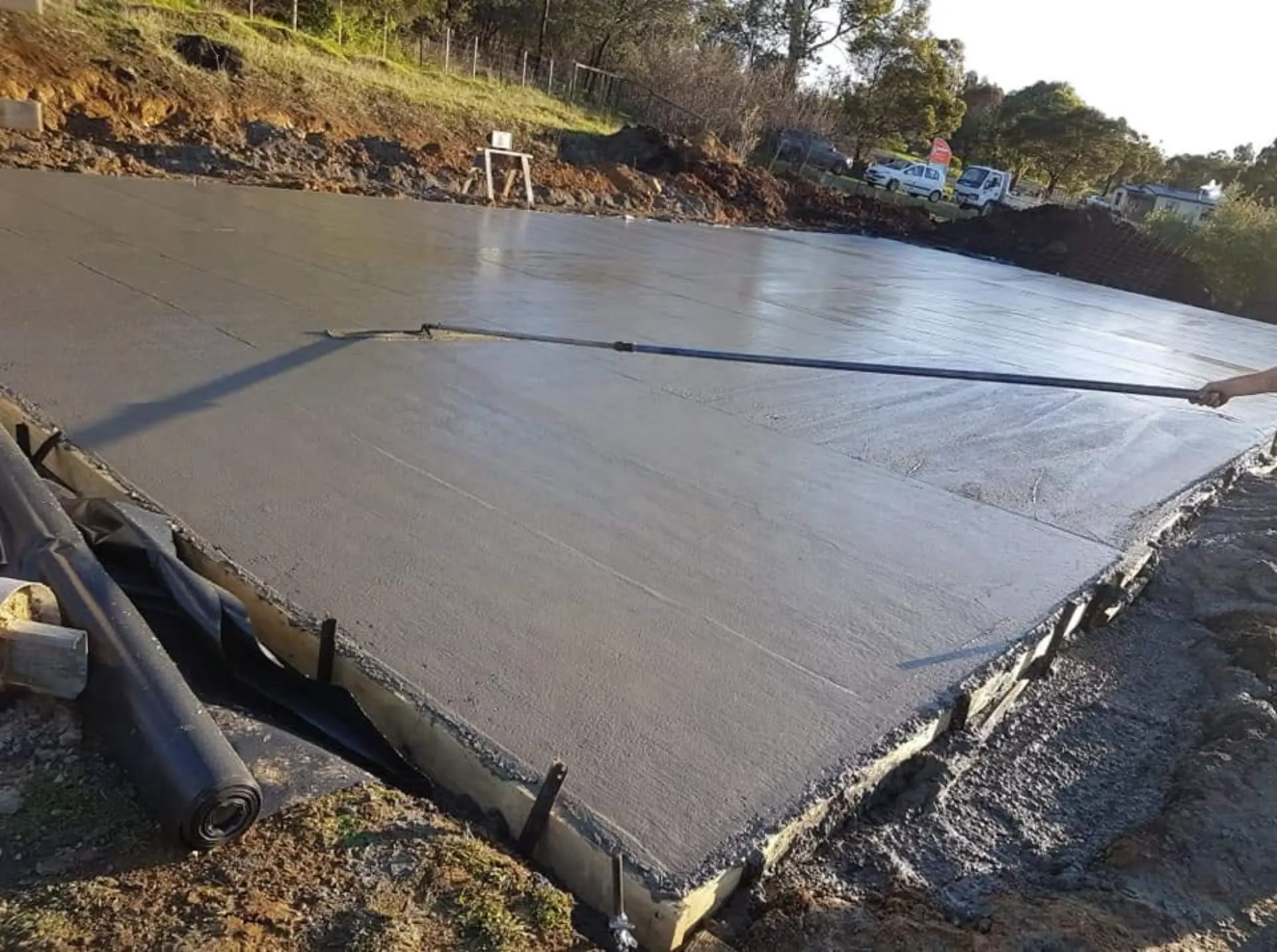 A large formed slab cured and ready for building on a cut-in site