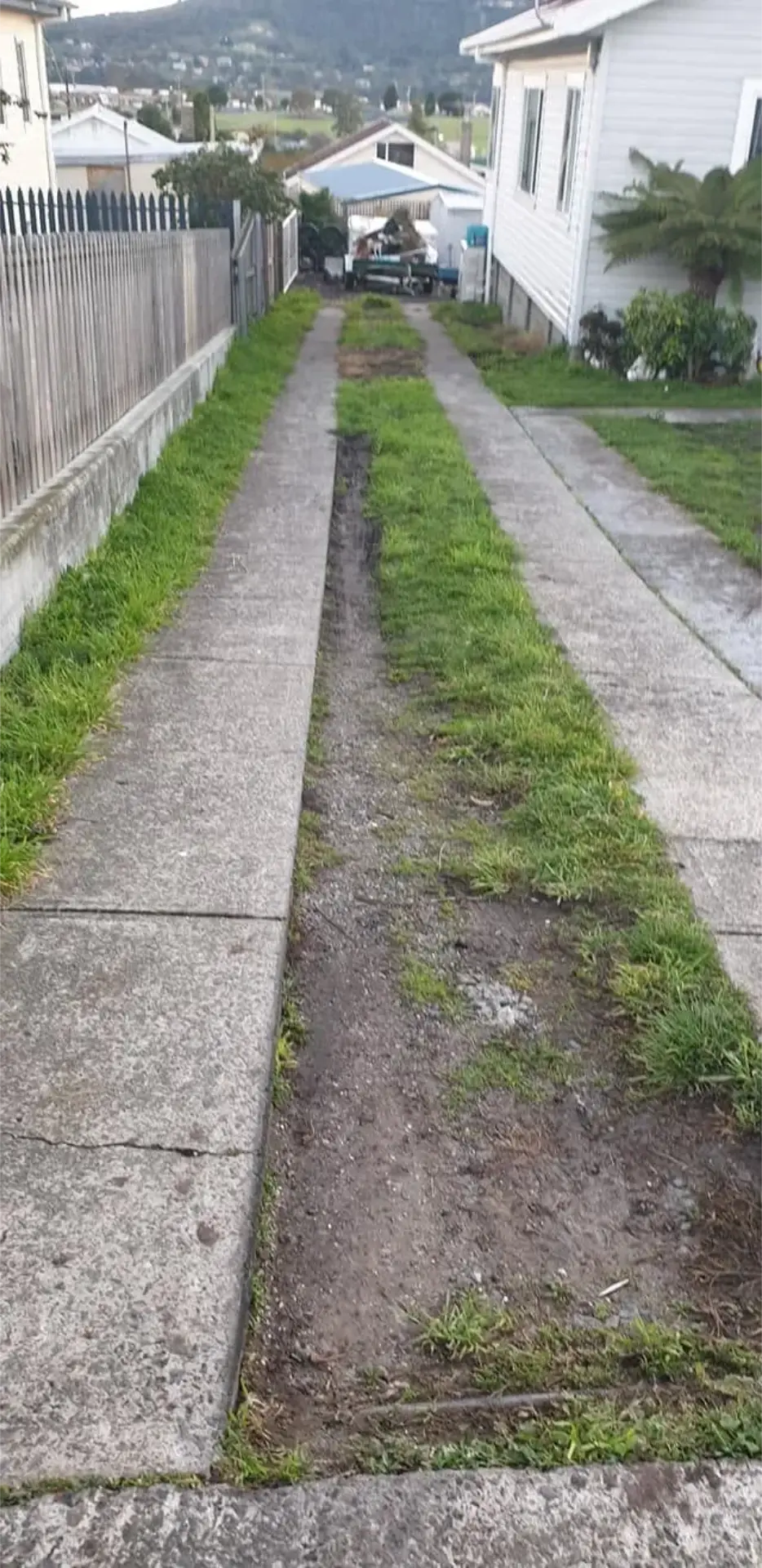 An old concrete path lifted and prepared for a fresh replacement pour
