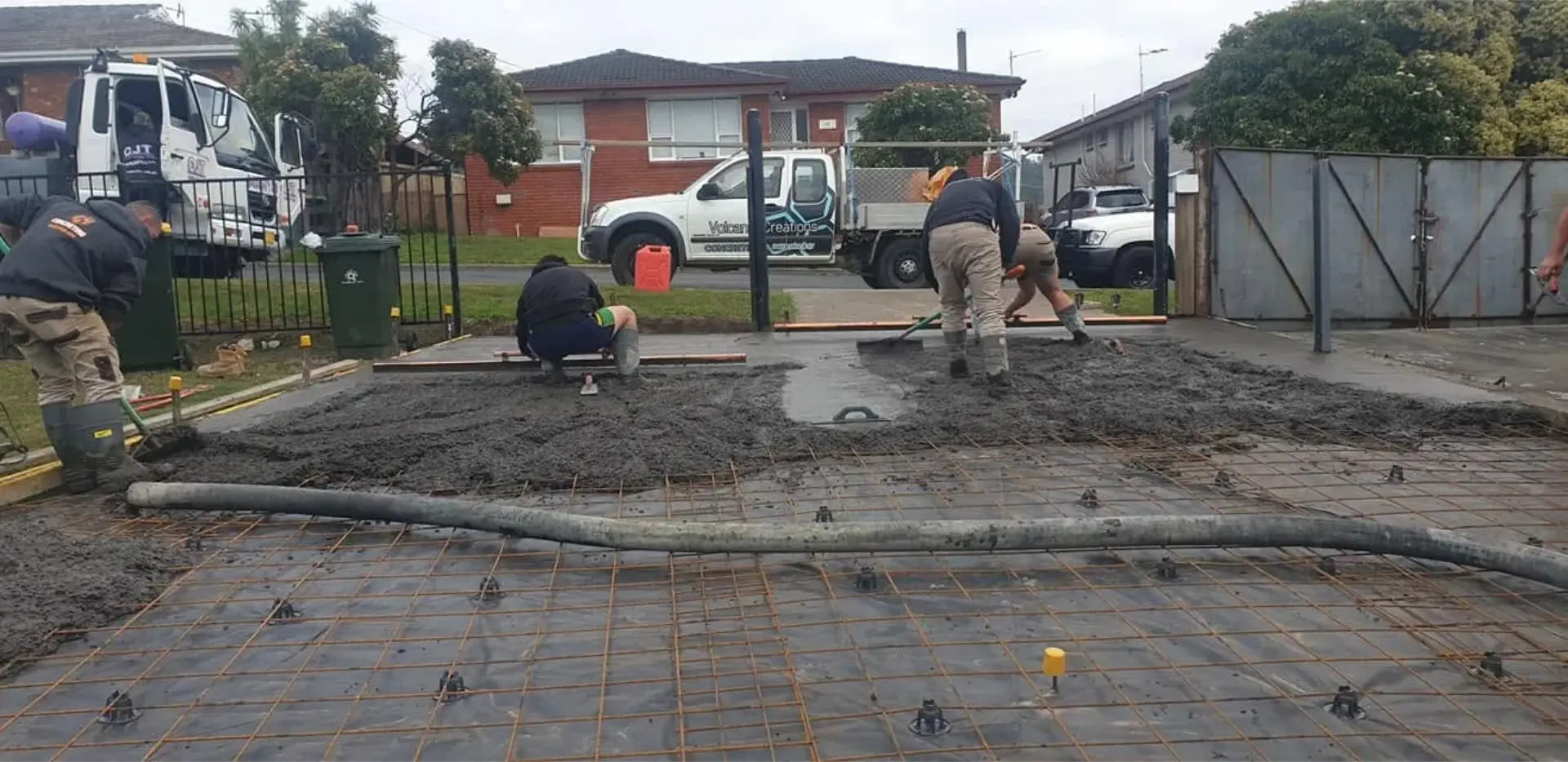 Steel reinforcement mesh tied out over a prepared footing bed before the pour