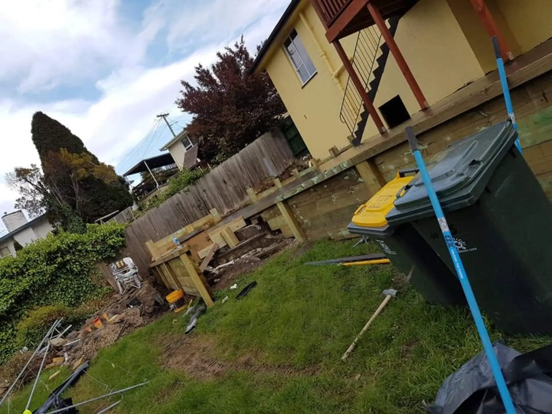 Timber formwork and bearers set to level over an excavated footing line